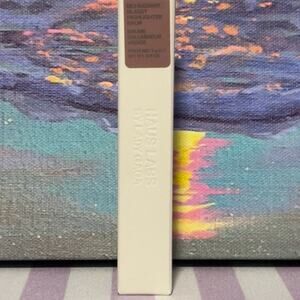 Haus Labs Bio-Radiant Glassy Highlighter Balm in Glassy Pink Opal